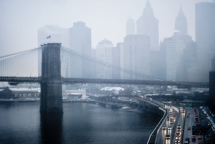 Brooklyn Bridge in Fog with City Skyline