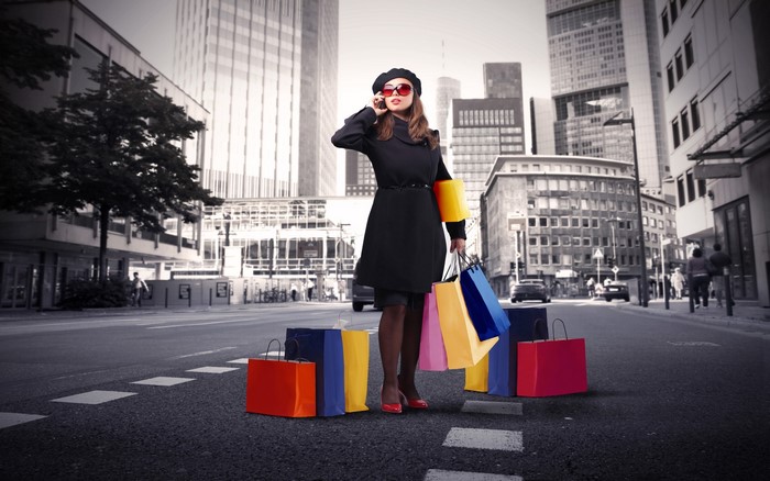 Woman with shopping bags on a city street