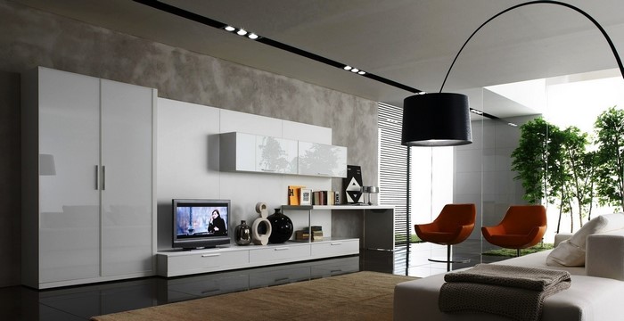 Modern living room with white furniture and orange chairs