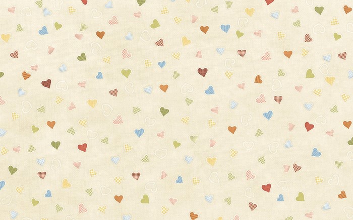 Scattered hearts pattern on a textured surface