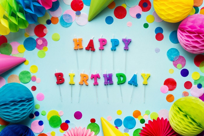 Happy Birthday candles and party decorations