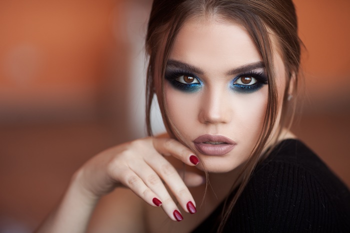 Portrait of Woman with Blue Eye Makeup