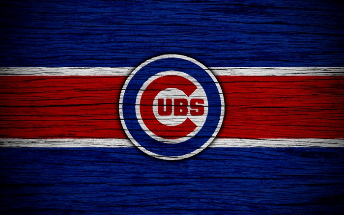 Chicago Cubs logo on a wooden background