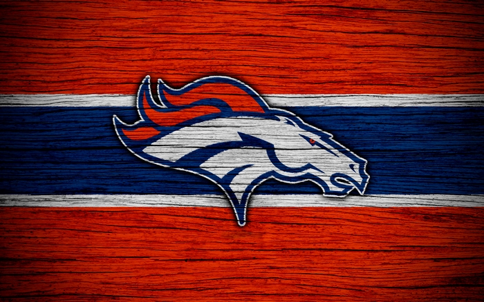 Denver Broncos logo on wood grain background