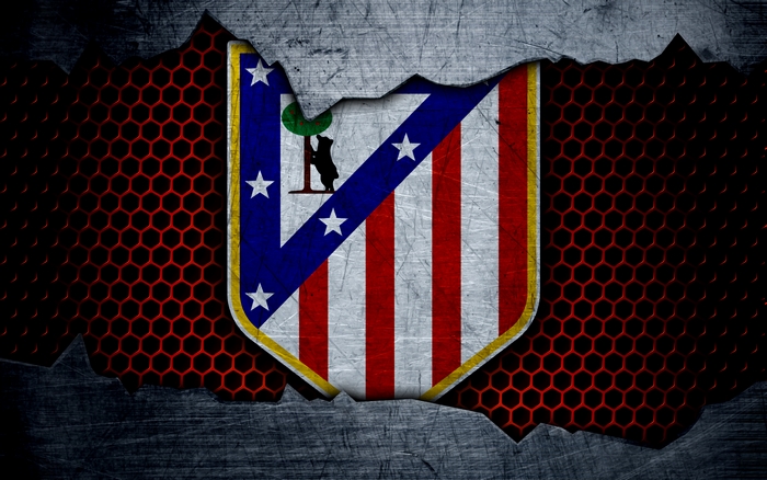 Atlético Madrid logo on a metallic background