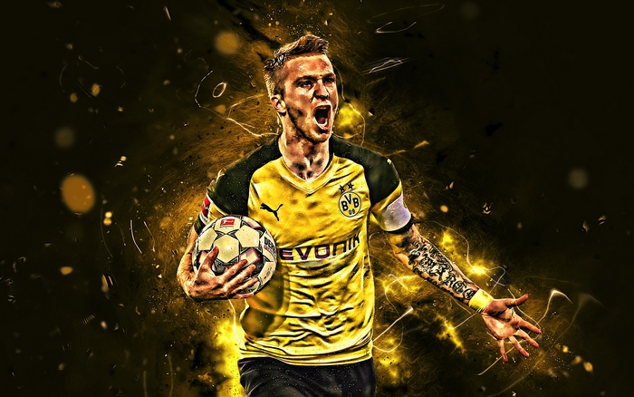 Marco Reus of Borussia Dortmund holding a soccer ball