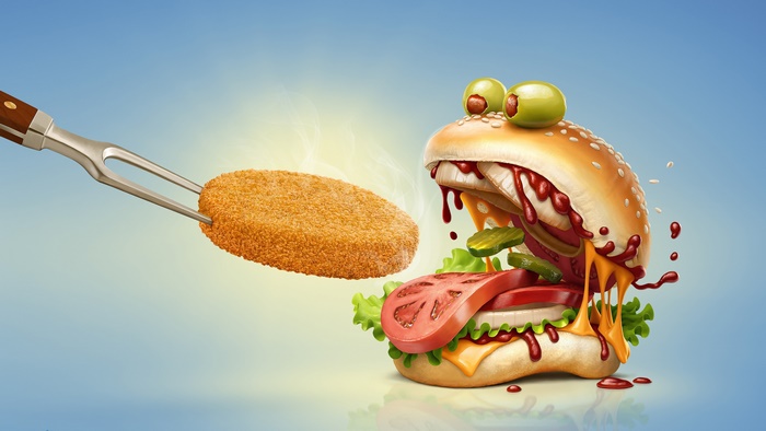Burger with a chicken nugget on a fork