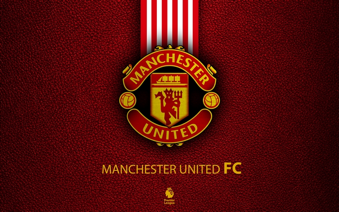 Manchester United FC logo on red textured background