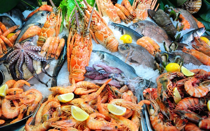 Assortment of fresh seafood on ice