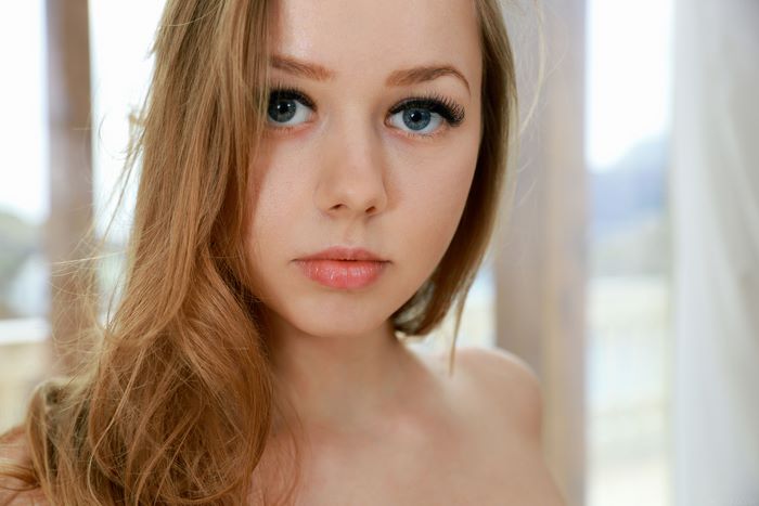 Blonde woman with blue eyes