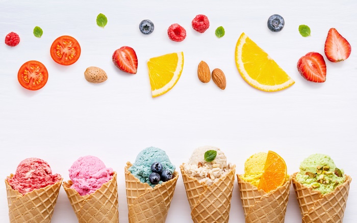 Ice cream cones with fruits and nuts