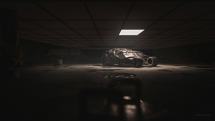 The Batmobile Tumbler from The Dark Knight in a dark garage