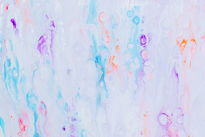 Abstract acrylic paint pour with pastel colors