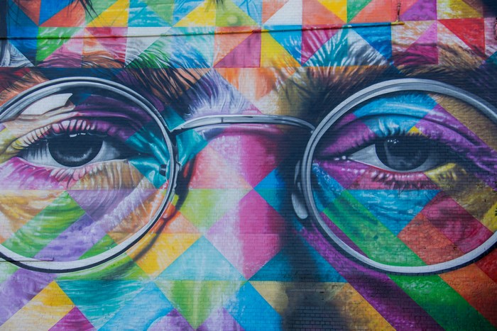 Mural of John Lennon's eyes wearing glasses