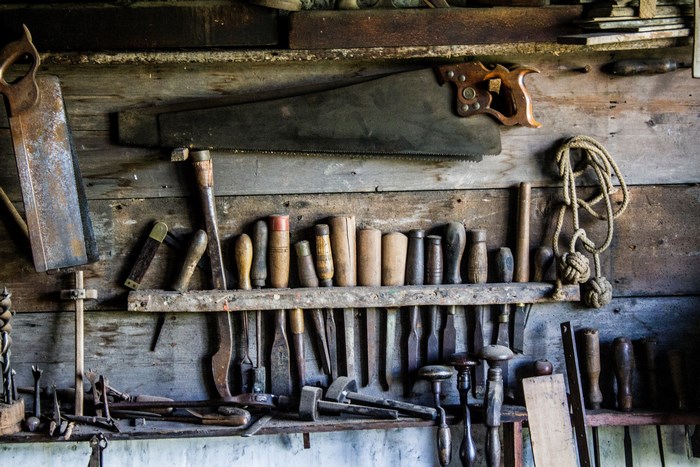 Rustic workshop with vintage woodworking tools and saws