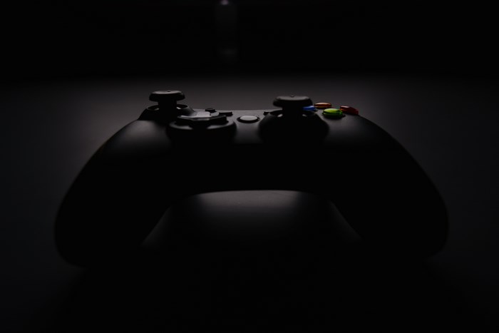 Black Xbox controller on a dark background