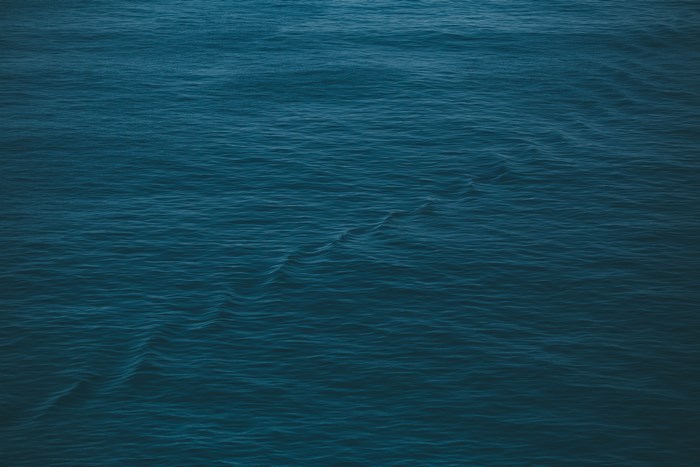 Blue ocean water with small waves