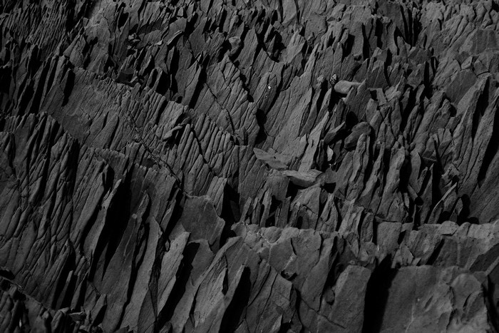 Rough Textured Grey Rock Cliff Formation