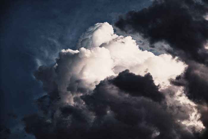 Dramatic storm clouds with light and dark contrast