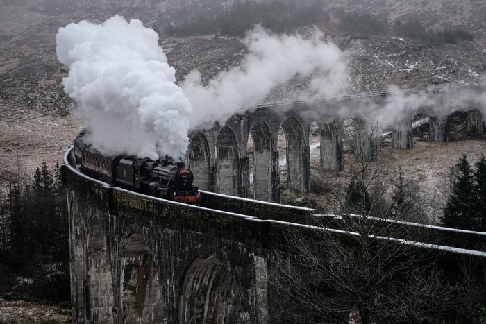 Hogwarts Express Steam Train Crossing Stone Viaduct