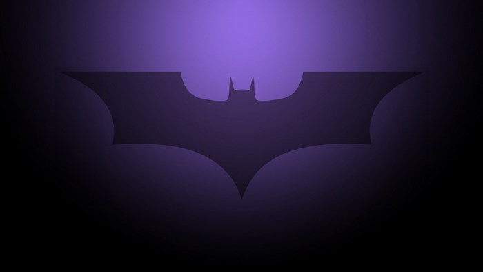 Batman logo on purple background