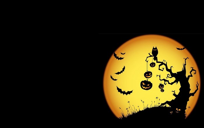 Halloween night with a full moon, bats, and pumpkins