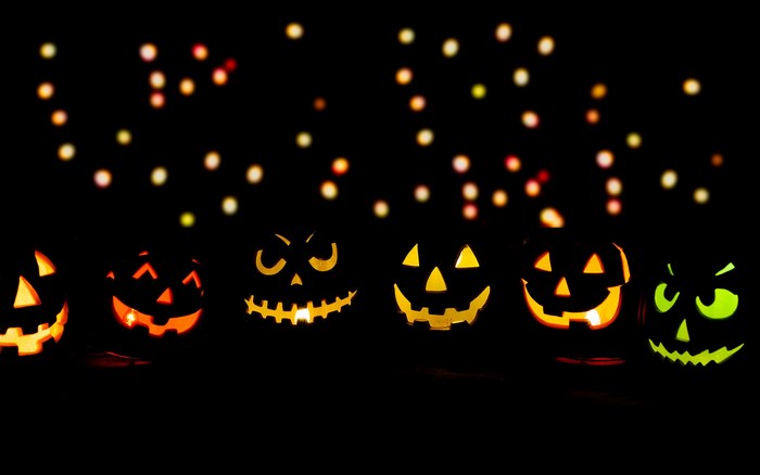 Halloween pumpkins with bokeh lights