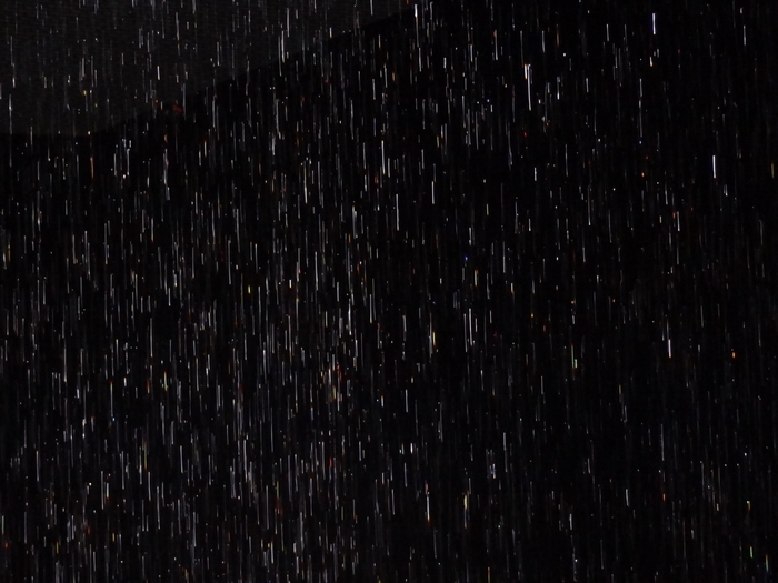 Rain streaks on a black background