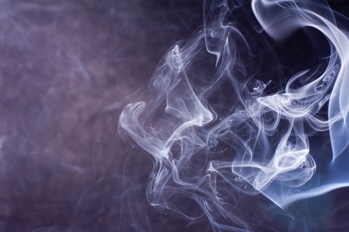 Abstract smoke patterns on a dark background
