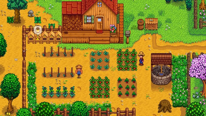 Stardew Valley farm with crops and buildings