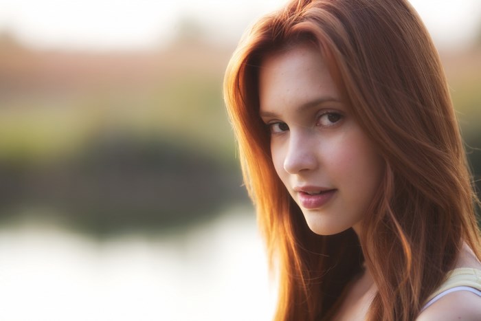 Portrait of Alexia Fast with Red Hair in Soft Light
