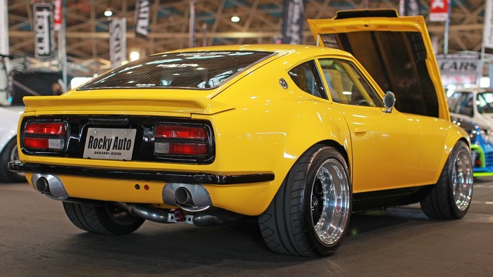 Yellow Datsun 240Z with Rocky Auto license plate