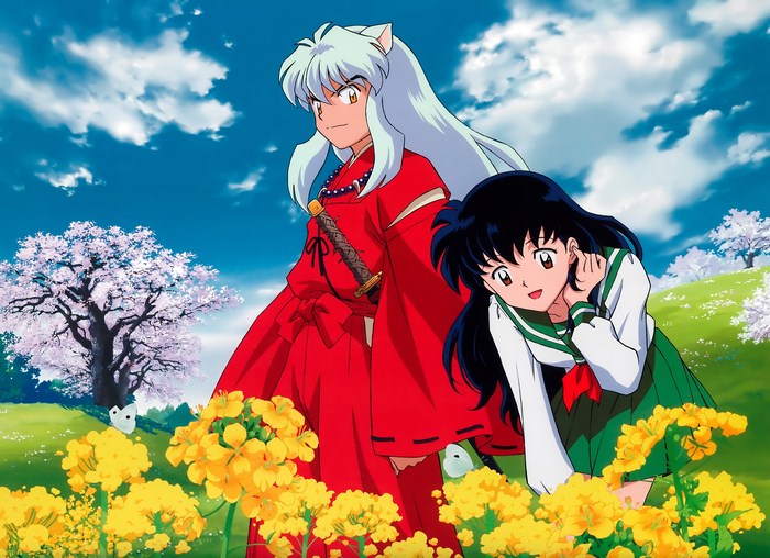Inuyasha and Kagome in a field of flowers