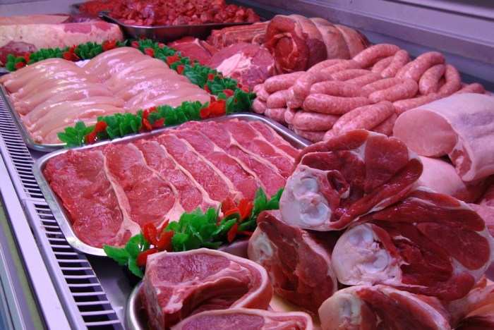 Assorted Fresh Raw Meats in Display Case