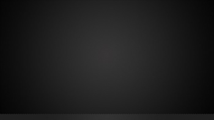 Dark grey textured background with a subtle vignette