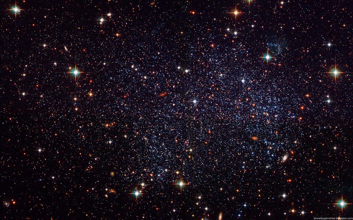 Deep space filled with stars and galaxies