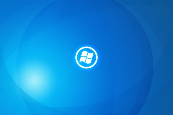 Windows 10 Logo on Blue Abstract Background