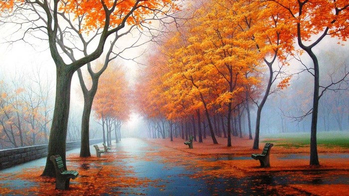 Autumn park path with benches and fallen leaves