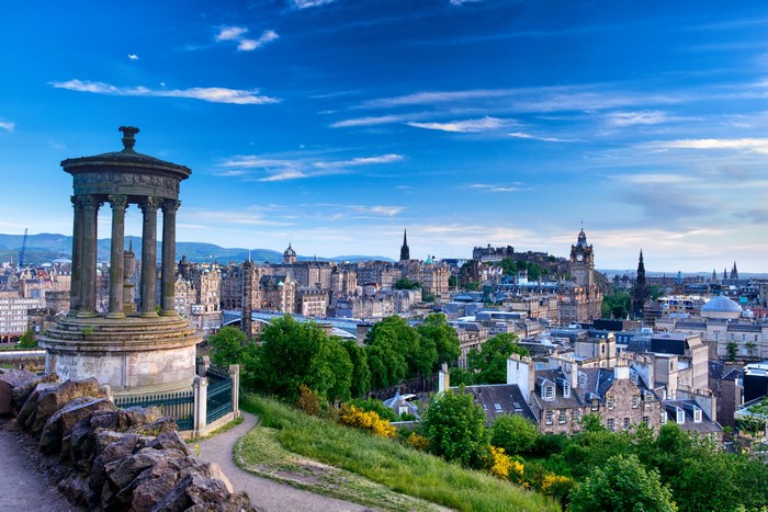 Edinburgh cityscape with Nelson Monument and Edinburgh Castle