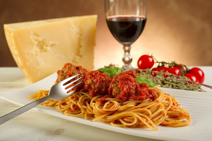 Spaghetti and meatballs with parmesan and red wine