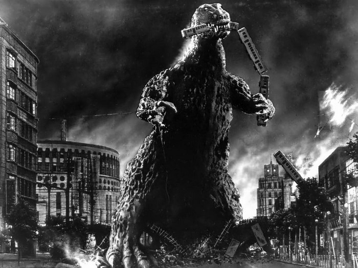 Godzilla destroying Tokyo with trains