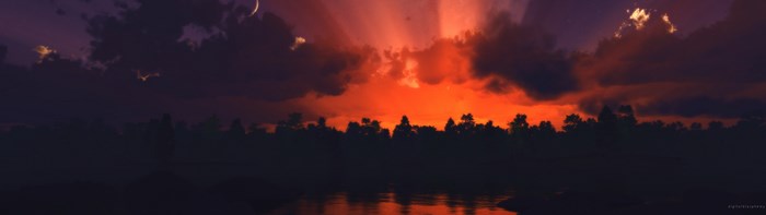 Sunset over forest and lake
