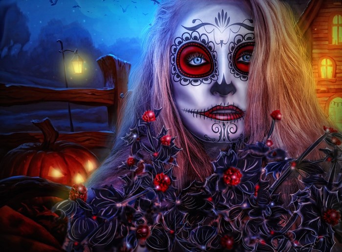 Woman with Sugar Skull Makeup and Halloween Pumpkin
