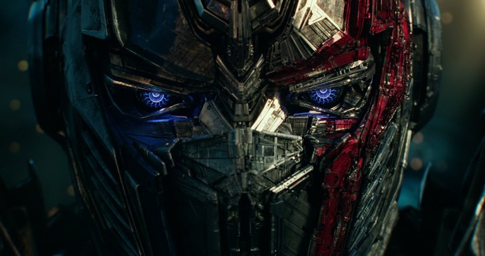 Close-Up of Transformer Robot Face with Blue Eyes