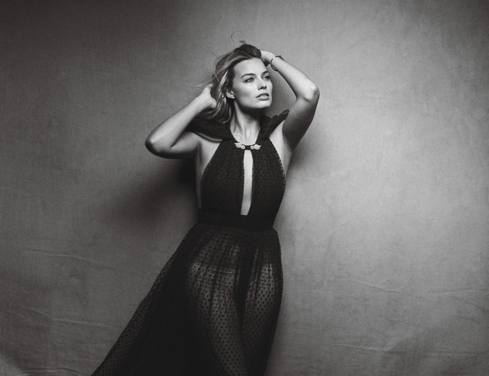 Margot Robbie in a black dress