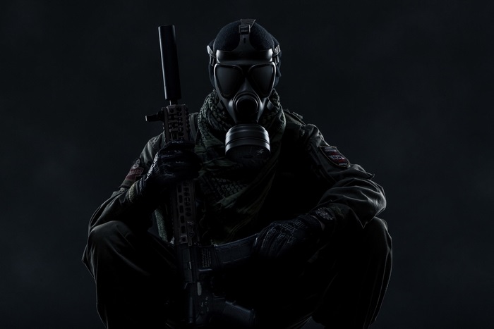 Ghost Recon Wildlands character with gas mask and rifle