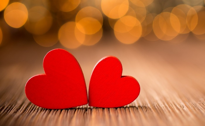 Two Red Hearts with Warm Glowing Lights