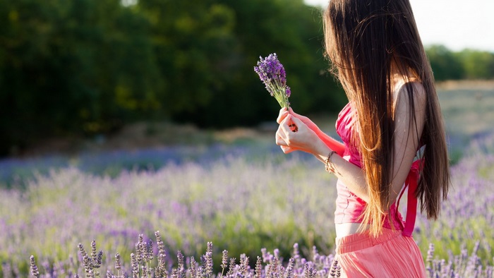 4K Girl Holding Lavender Bouquet in Field