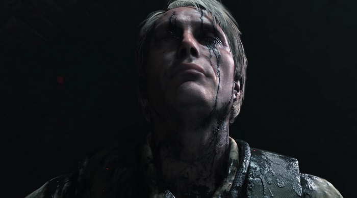 Man with black substance on face from Death Stranding