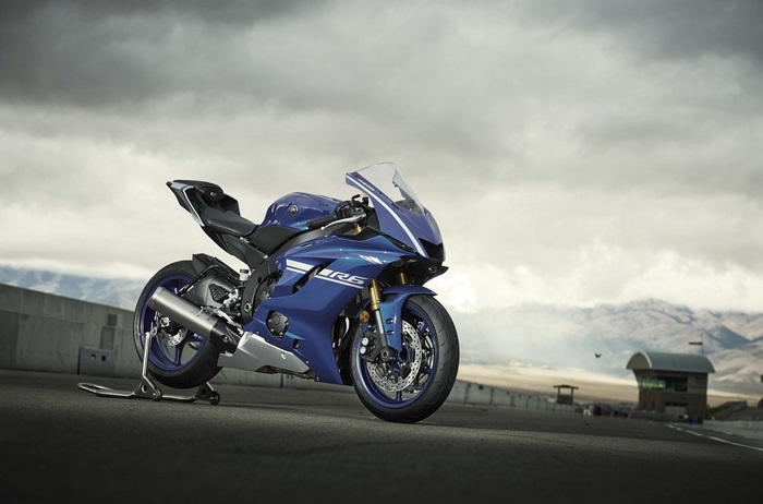 Blue Yamaha YZF R6 motorcycle on a racetrack